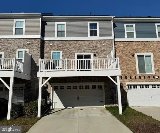 a front view of a house with a balcony