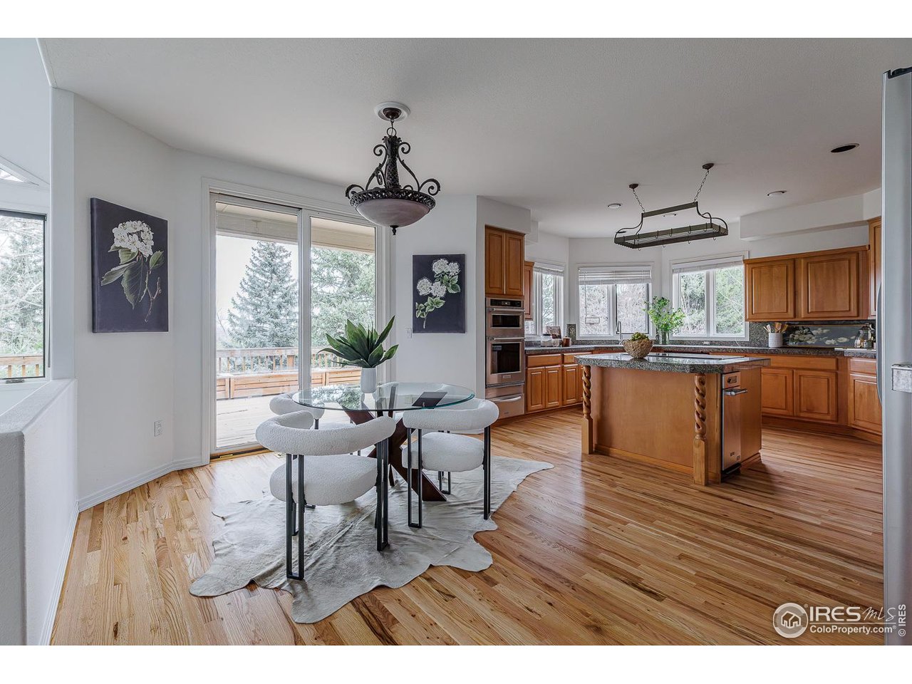 8461 Pawnee Lane Niwot, CO 80503 - Photo 11 of 31 Eat-in kitchen space with access to back deck