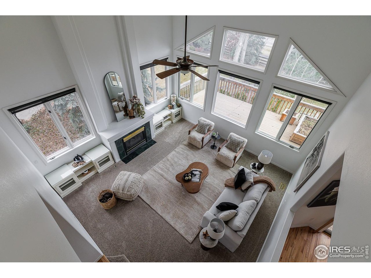8461 Pawnee Lane Niwot, CO 80503 - Photo 14 of 31 Large Family room overlooking backyard