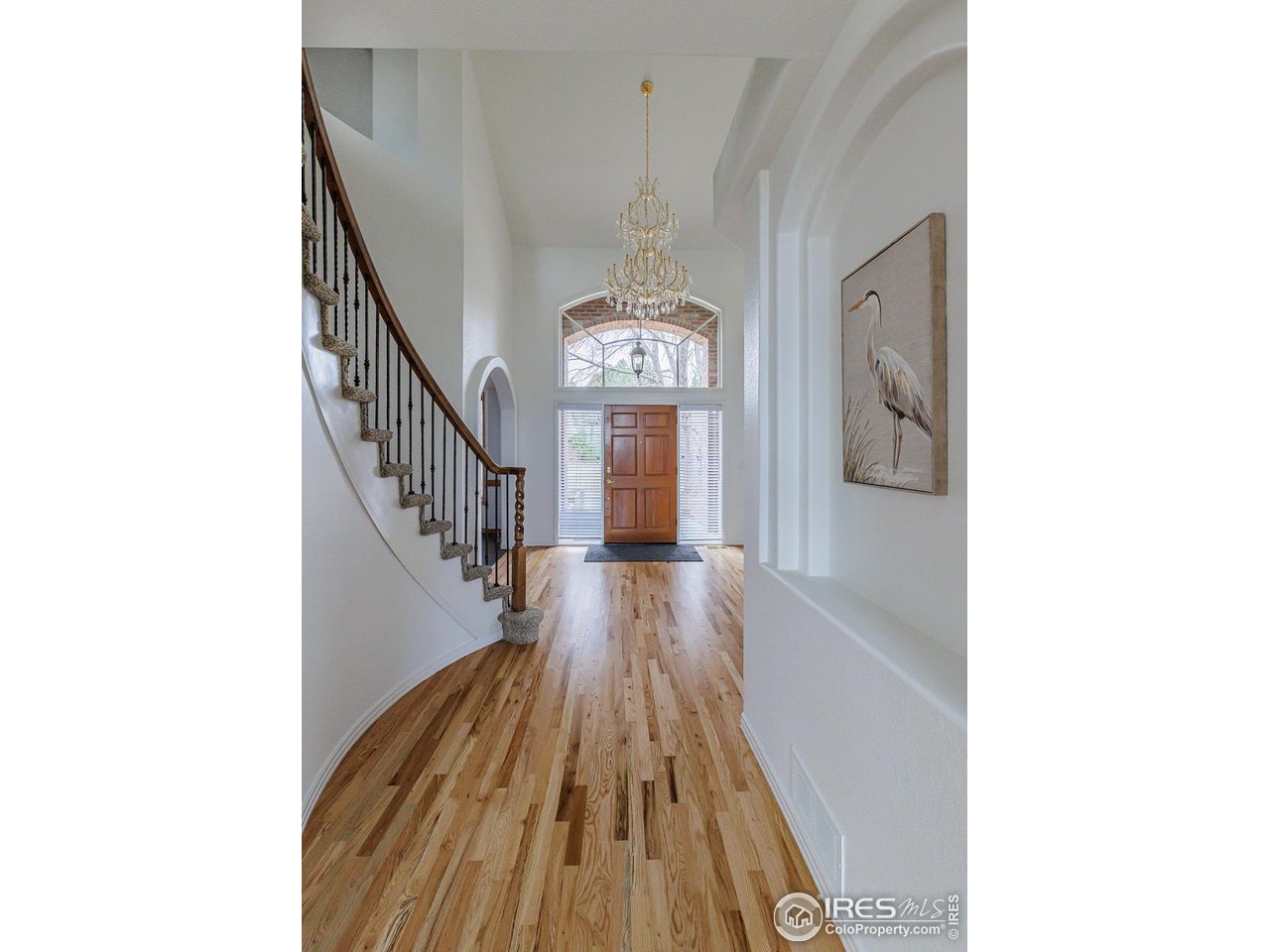 8461 Pawnee Lane Niwot, CO 80503 - Photo 5 of 31 Winding staircase from entry