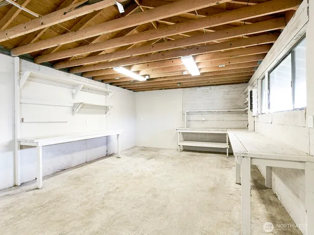 a view of an empty room with a windows