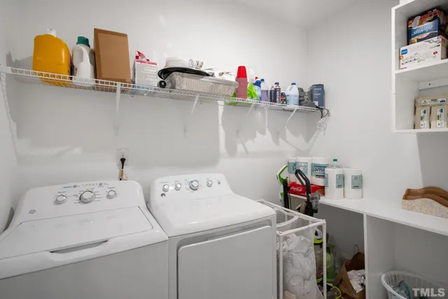 a storage room with washer and dryer