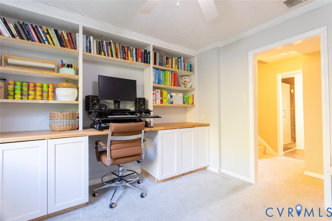 4157 New Market Road Henrico, VA 23231 - Photo 22 of 43 Home office featuring built in desk, light carpet,