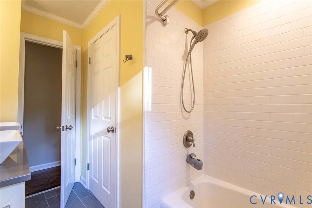 4157 New Market Road Henrico, VA 23231 - Photo 28 of 43 Full bath with vanity, crown molding, shower / tub
