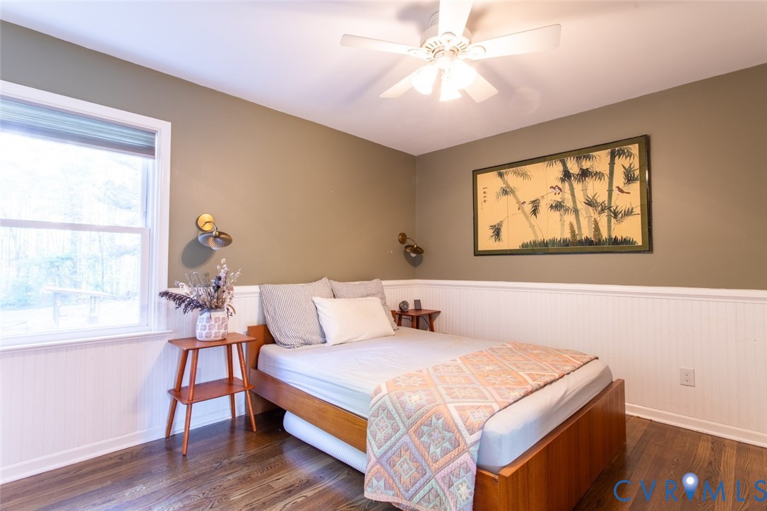 4157 New Market Road Henrico, VA 23231 - Photo 29 of 43 Bedroom with wainscoting, dark wood finished floor