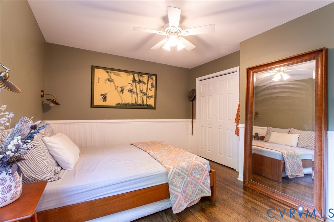 4157 New Market Road Henrico, VA 23231 - Photo 30 of 43 Bedroom with wainscoting, ceiling fan, a closet, a