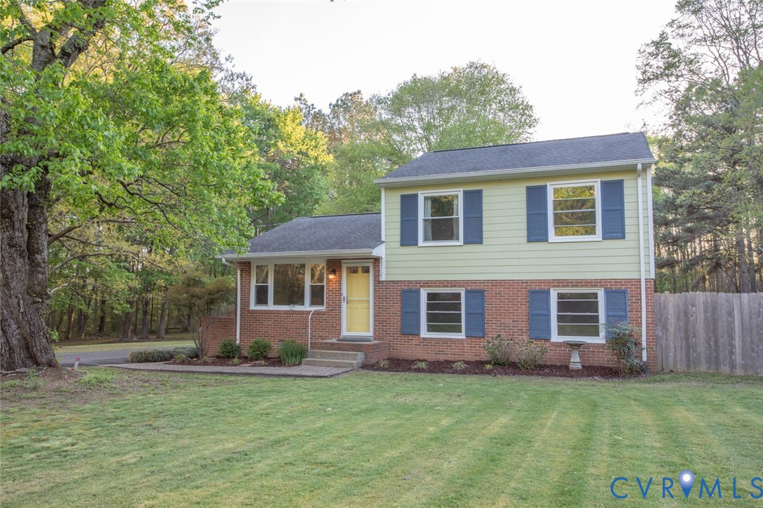 4157 New Market Road Henrico, VA 23231 - Photo 3 of 43 Split level home with brick siding, covered porch,