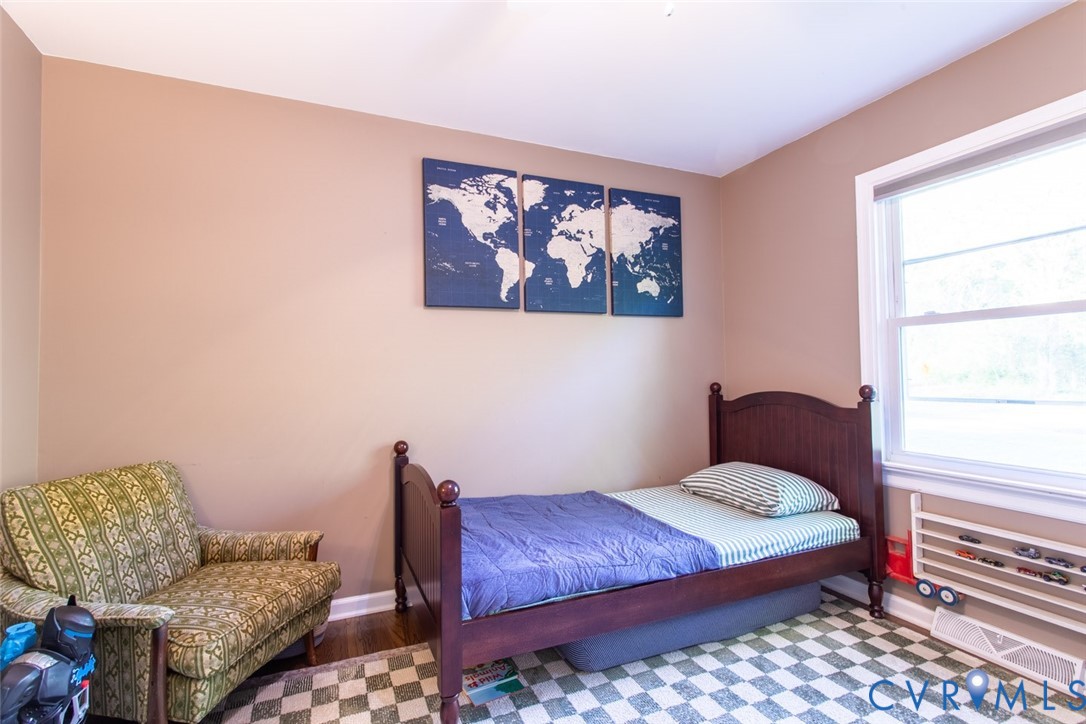4157 New Market Road Henrico, VA 23231 - Photo 32 of 43 Bedroom with baseboards and wood finished floors