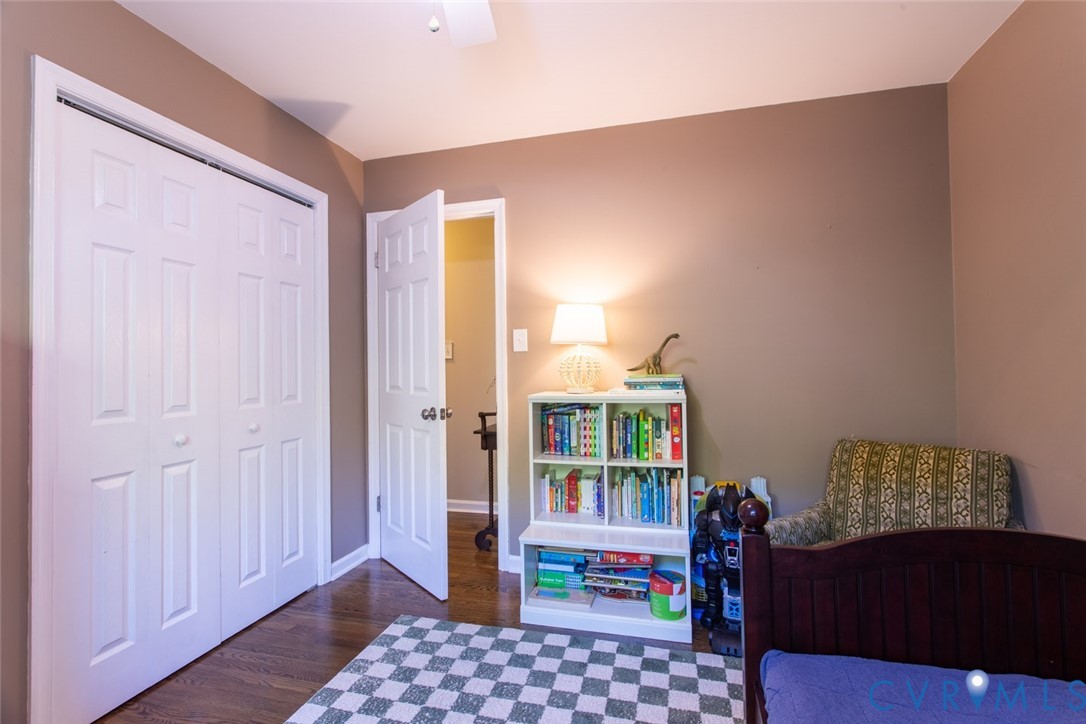 4157 New Market Road Henrico, VA 23231 - Photo 33 of 43 Bedroom with a closet, dark wood-style flooring, a