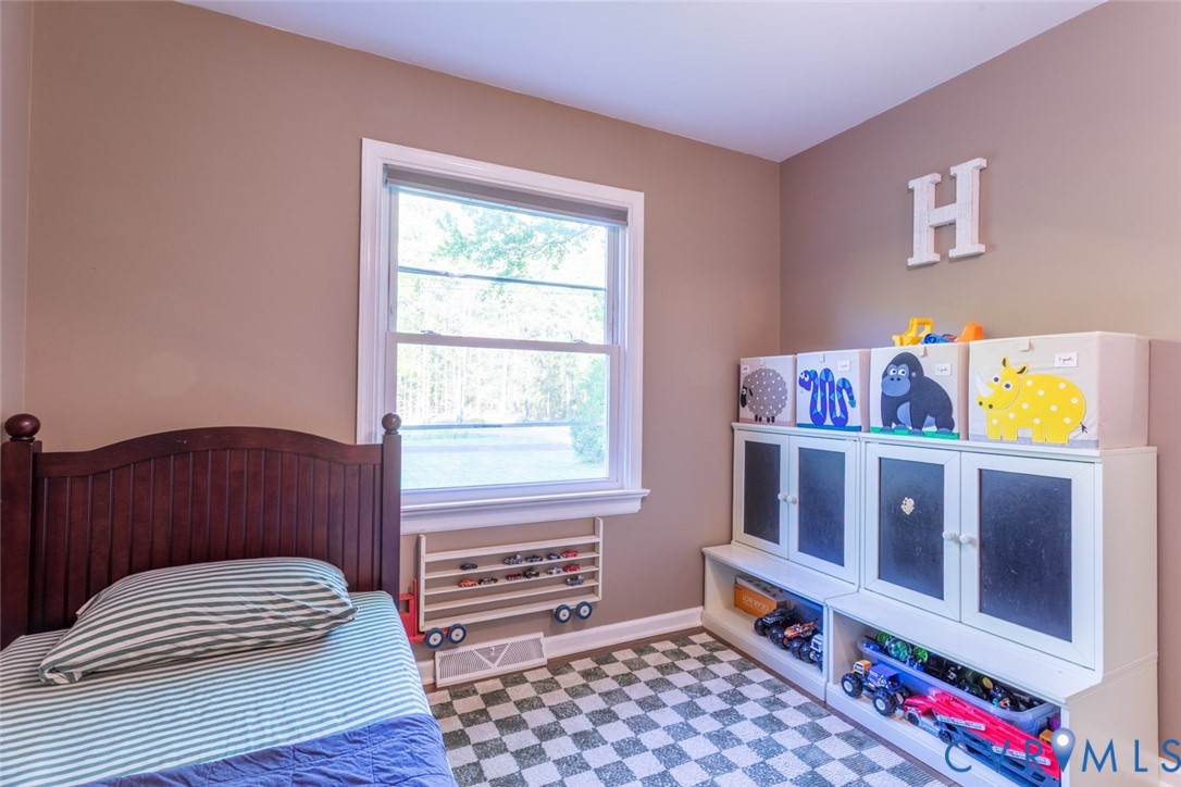4157 New Market Road Henrico, VA 23231 - Photo 34 of 43 Bedroom featuring baseboards