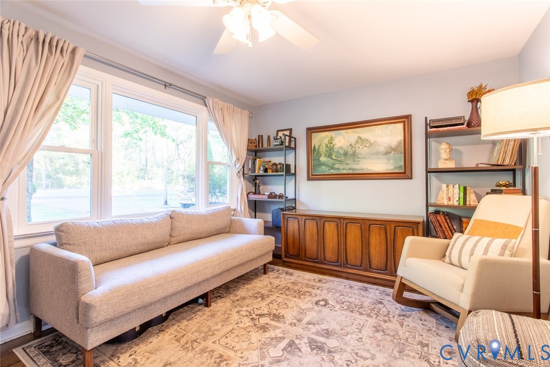 4157 New Market Road Henrico, VA 23231 - Photo 6 of 43 Living area with a ceiling fan and light wood-type