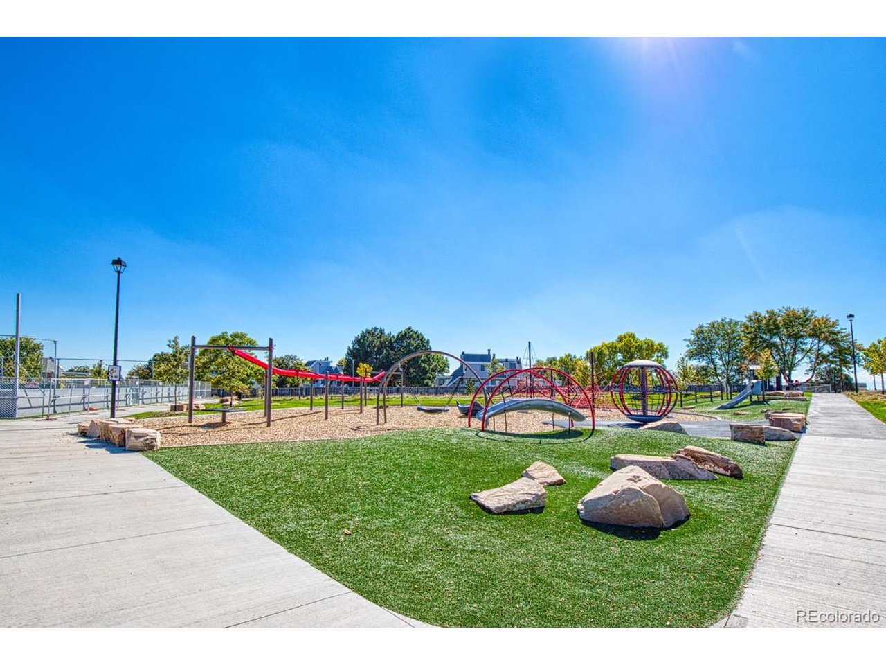 8701 Huron Street, Unit 209 Thornton, CO 80260 - Photo 19 of 25 a view of an outdoor space and yard
