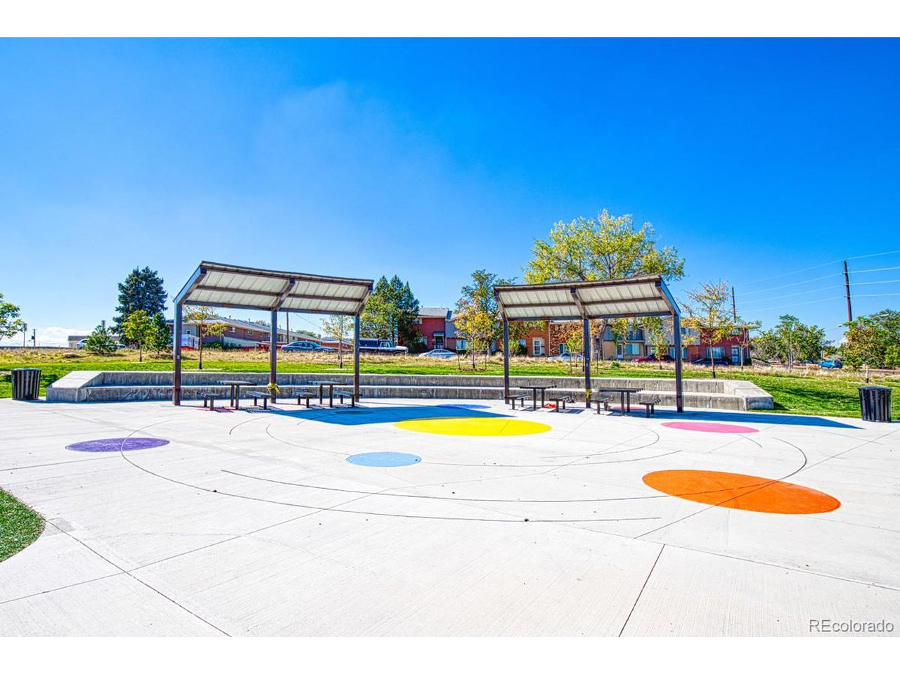 8701 Huron Street, Unit 209 Thornton, CO 80260 - Photo 22 of 25 a swimming pool with an outdoor space and seating area