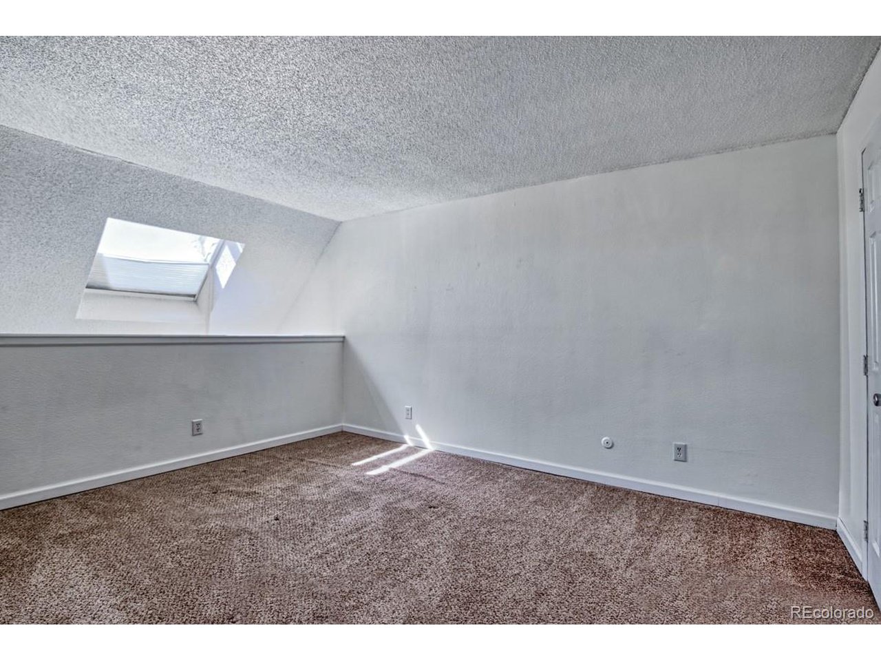8701 Huron Street, Unit 209 Thornton, CO 80260 - Photo 9 of 25 a view of an empty room