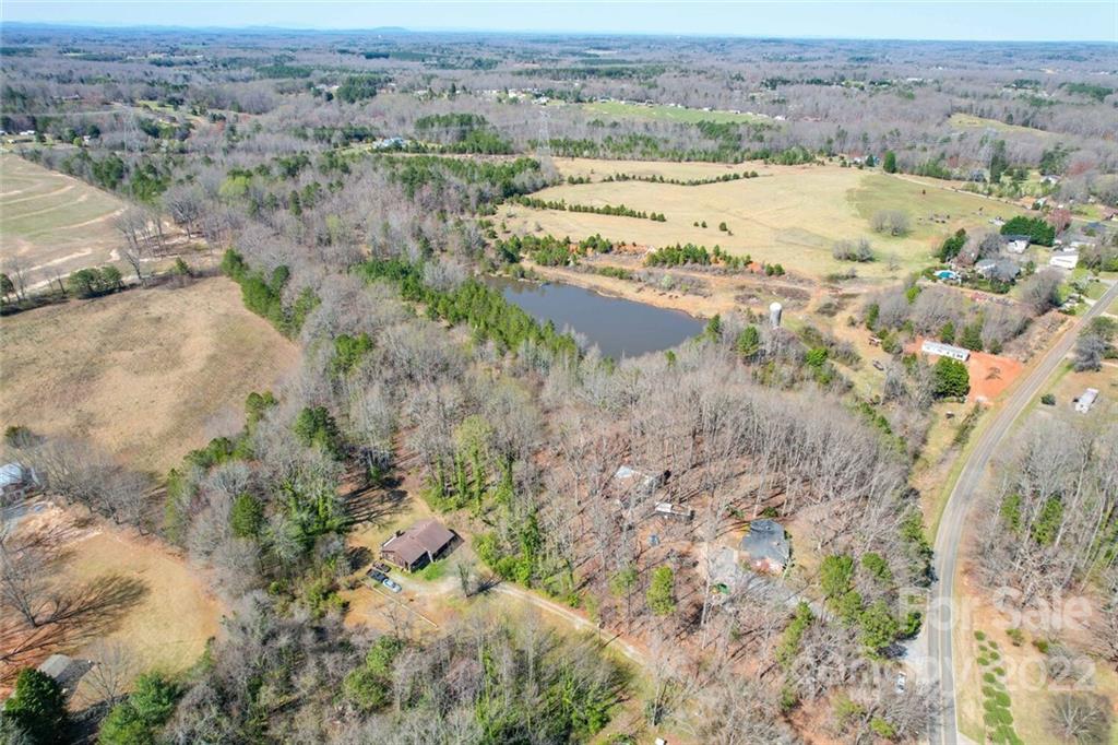 553 Loray Farm Road Dallas, NC 28034 - Photo 1 of 48 an aerial view of beach and yard