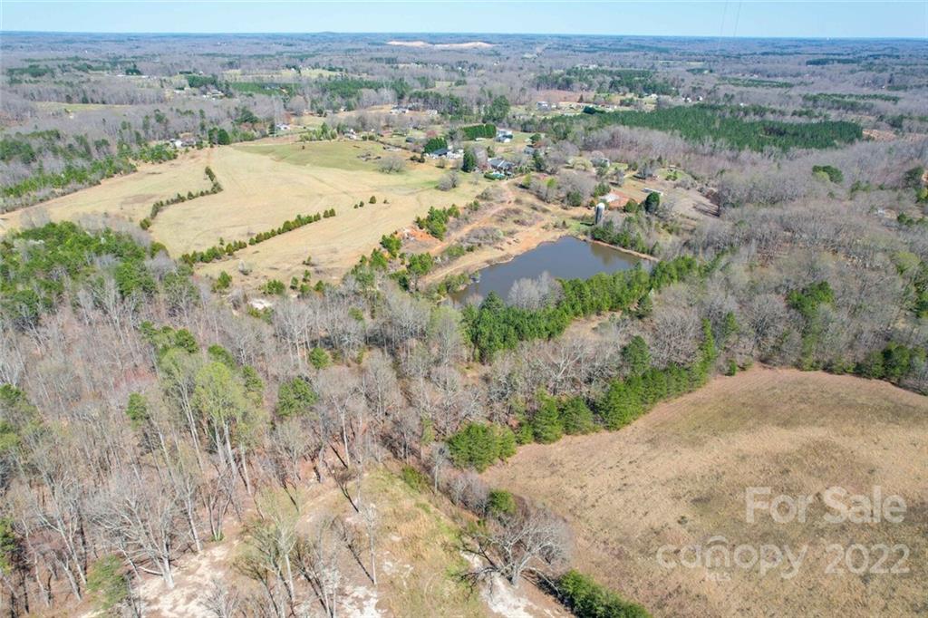553 Loray Farm Road Dallas, NC 28034 - Photo 13 of 48 an aerial view of a houses