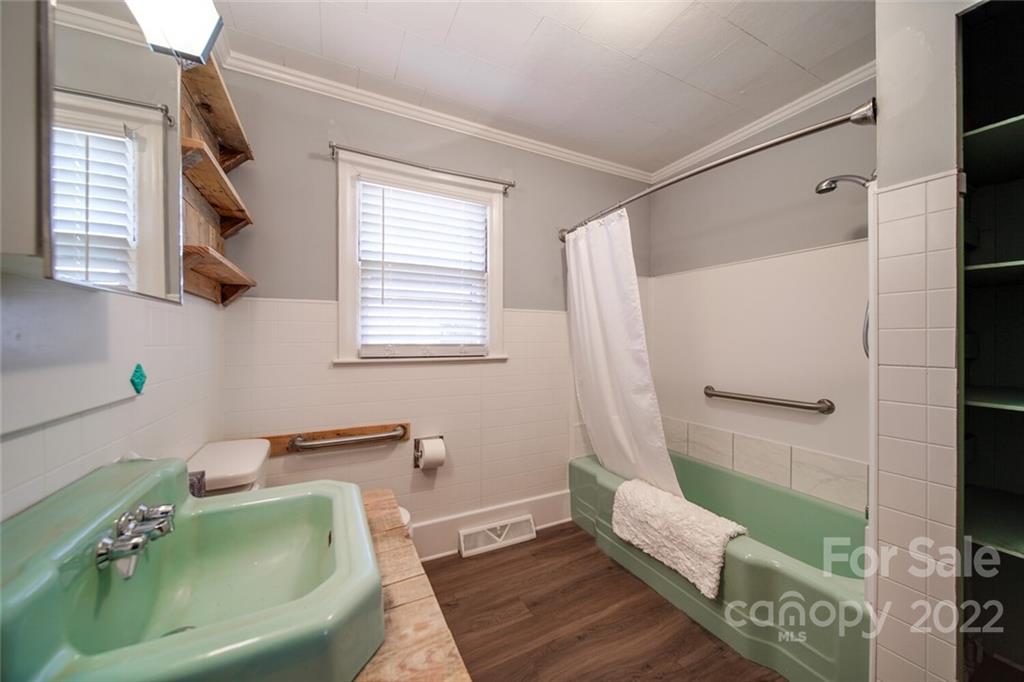 553 Loray Farm Road Dallas, NC 28034 - Photo 34 of 48 a bathroom with a tub and a sink