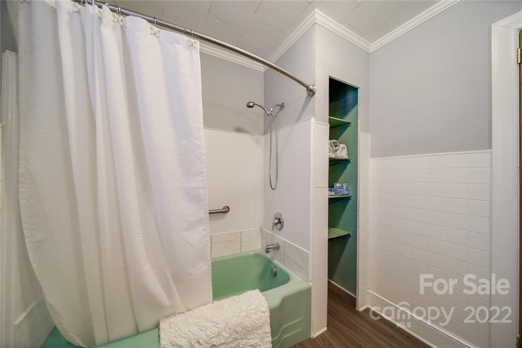 553 Loray Farm Road Dallas, NC 28034 - Photo 35 of 48 a bathroom with a shower and a toilet