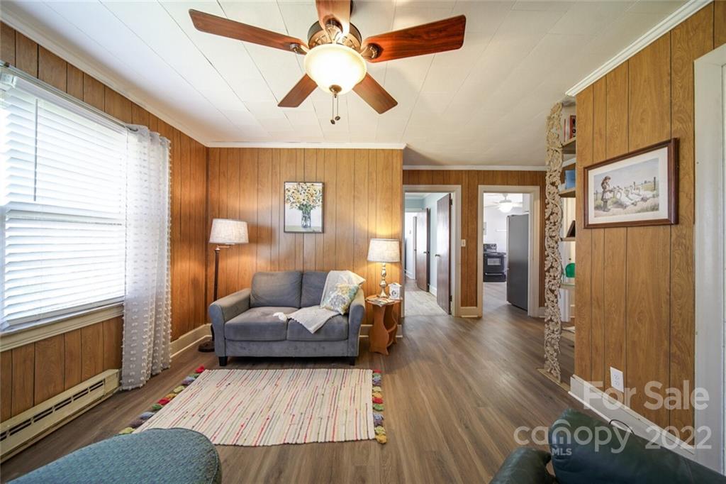 553 Loray Farm Road Dallas, NC 28034 - Photo 36 of 48 a living room with furniture and a large window