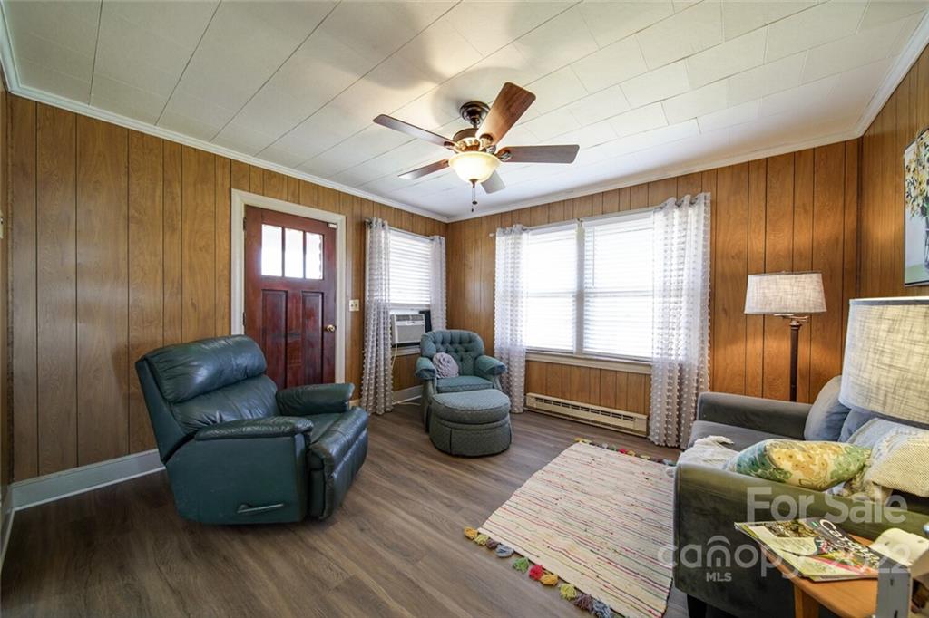 553 Loray Farm Road Dallas, NC 28034 - Photo 37 of 48 a living room with furniture and a large window