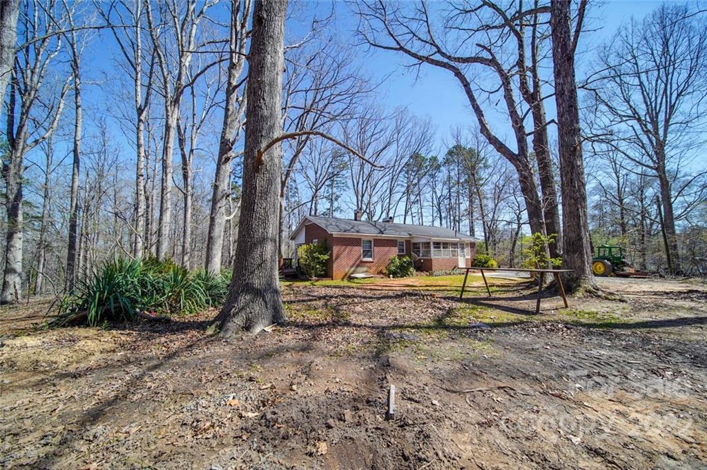 553 Loray Farm Road Dallas, NC 28034 - Photo 5 of 48 a view of a house with a yard and sitting area