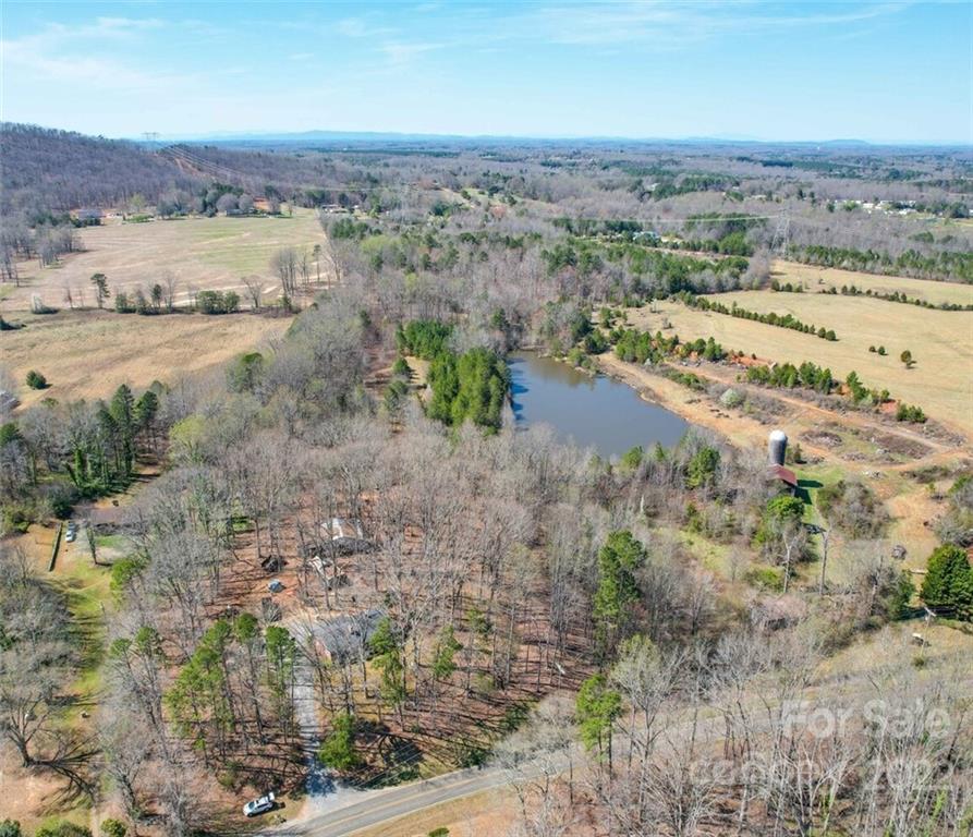 553 Loray Farm Road Dallas, NC 28034 - Photo 10 of 48 an aerial view of beach and residential space