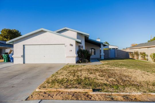 1116 Lee Avenue Ridgecrest, CA 93555 - Photo 3 of 32 a view of a house with a yard