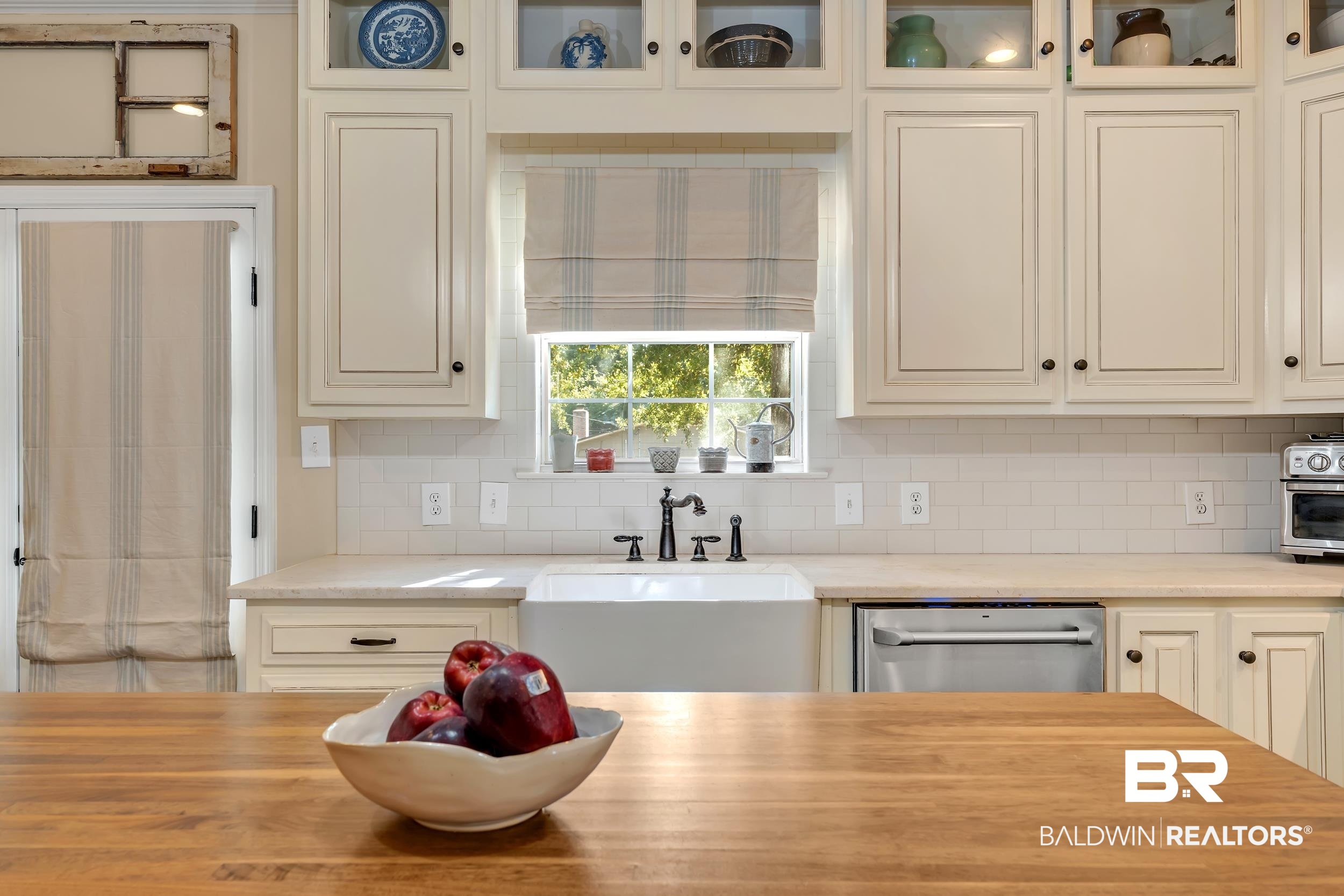 2 Navy Lane Daphne, AL 36527 - Photo 10 of 28 Kitchen featuring tasteful backsplash, dishwasher, and glass insert cabinets