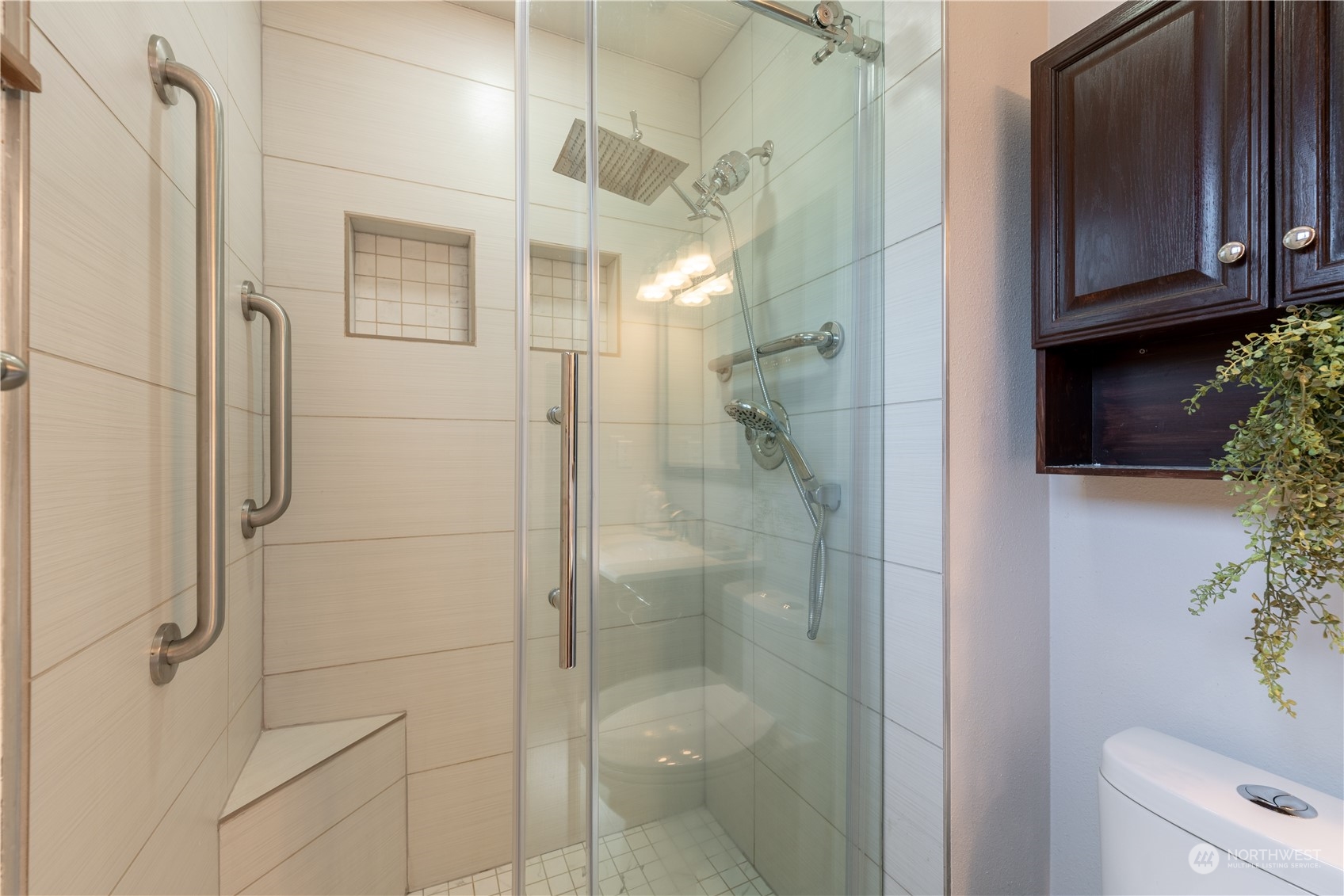 1213 228th Place Southwest Bothell, WA 98021 - Photo 30 of 40 a bathroom with a shower and a toilet