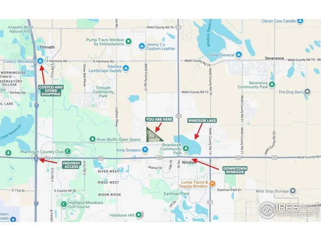 a view of a backyard with sitting area