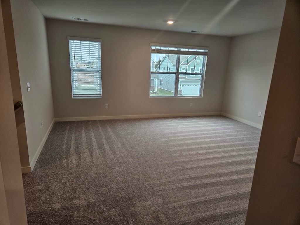 1311 Chambers Bay Drive, Unit LOT 802 Lebanon, TN 37087 - Photo 4 of 5 an empty room with windows