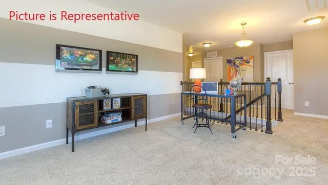 a view of a play room with furniture and a chandelier