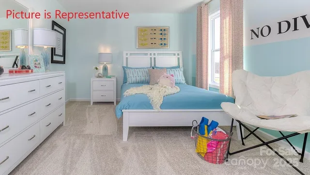 a bedroom with furniture and a bed