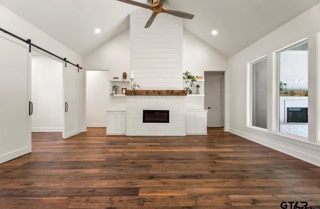 a view of a livingroom with a fireplace