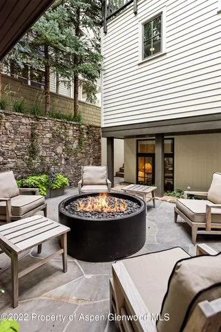 a outdoor space with patio furniture and a potted plant