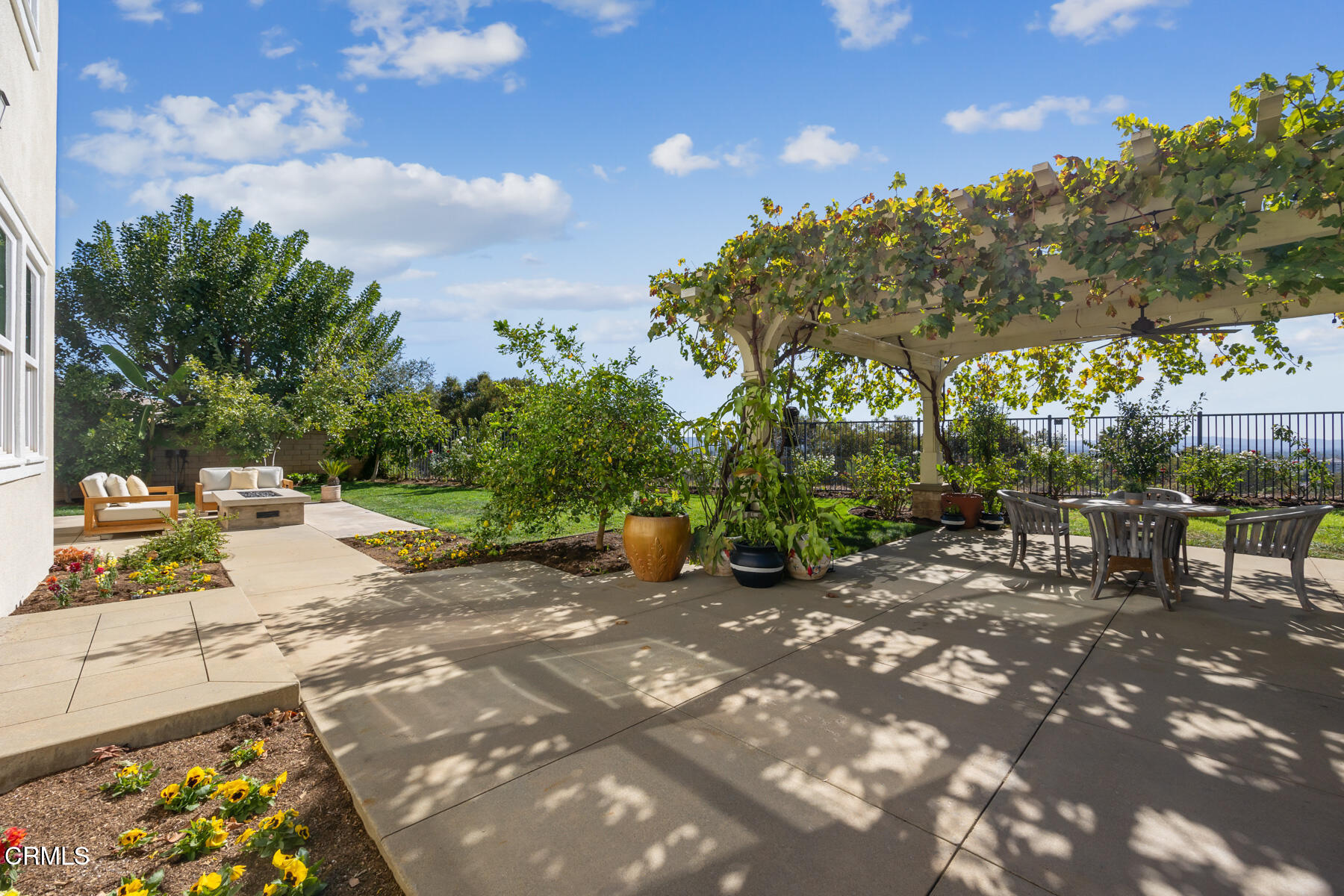 472 Desert Willow Road Azusa, CA 91702 - Photo 7 of 26 a view of a street with chairs and a fire pit