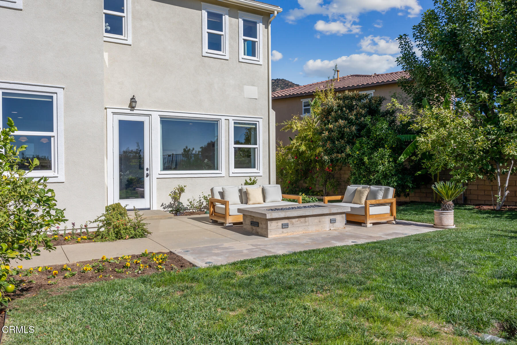 472 Desert Willow Road Azusa, CA 91702 - Photo 8 of 26 a view of a house with backyard sitting area and garden