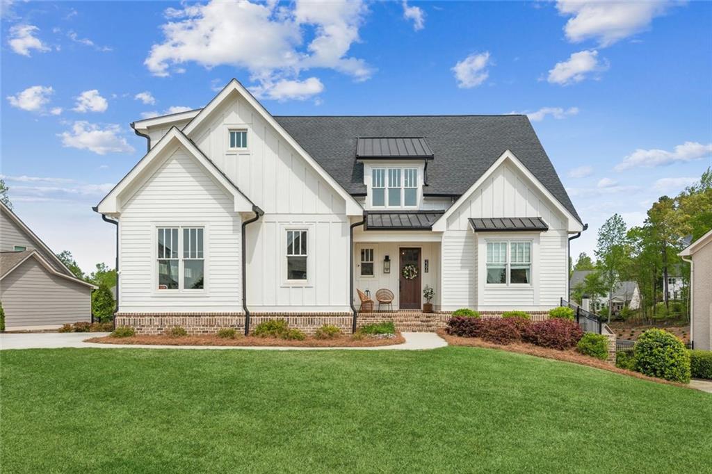 2398 Traditions Way Jefferson, GA 30549 - Photo 1 of 1 a front view of a house with a yard