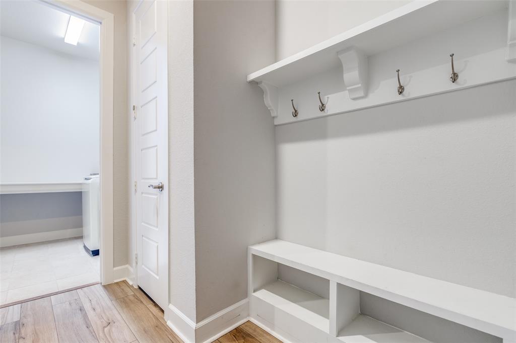 356 Greenbriar Road Little Elm, TX 75068 - Photo 21 of 25 Mudroom with light wood-type flooring and baseboards