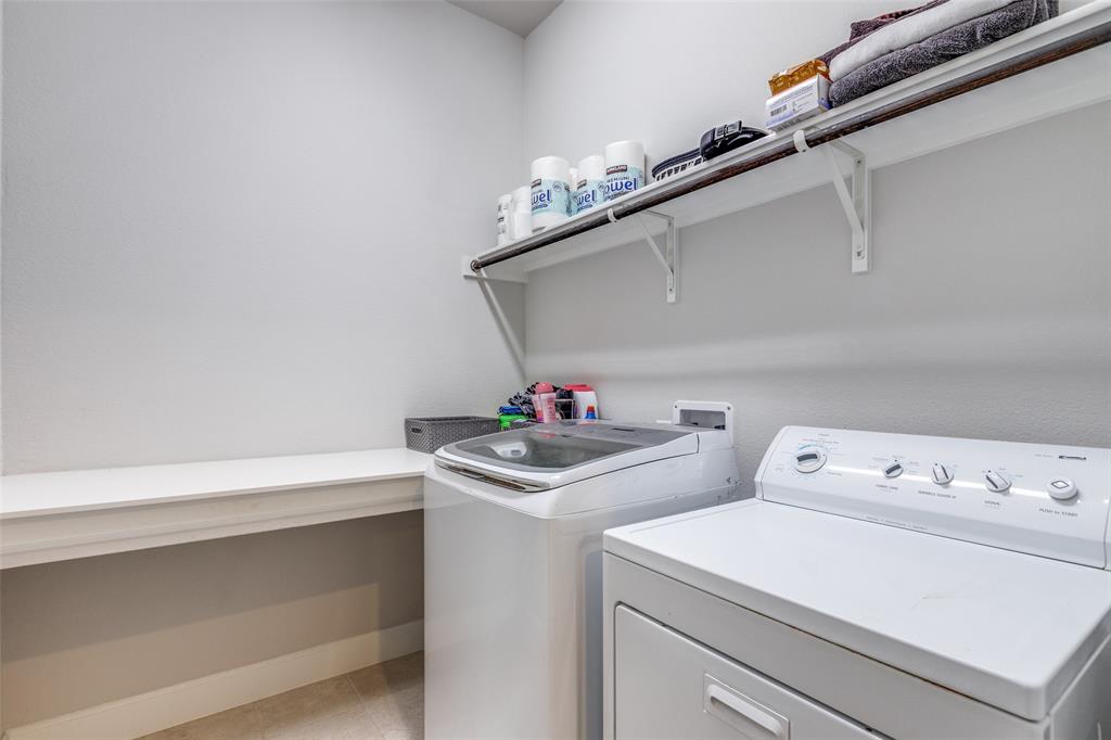 356 Greenbriar Road Little Elm, TX 75068 - Photo 22 of 25 Laundry room featuring washing machine and clothes dryer
