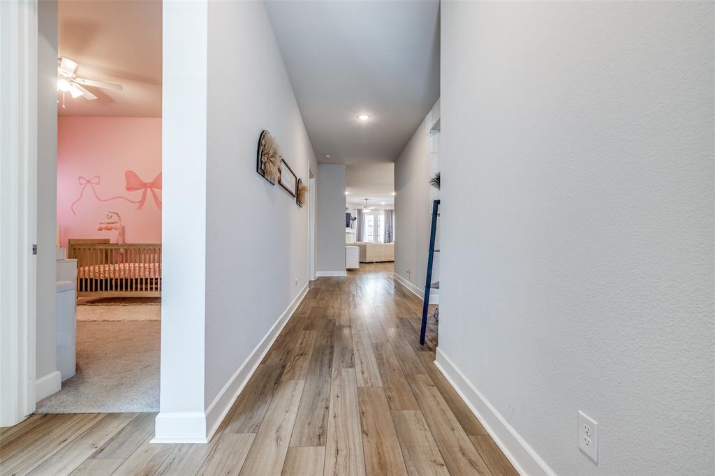 356 Greenbriar Road Little Elm, TX 75068 - Photo 5 of 25 Hall featuring light wood finished floors and recessed lighting
