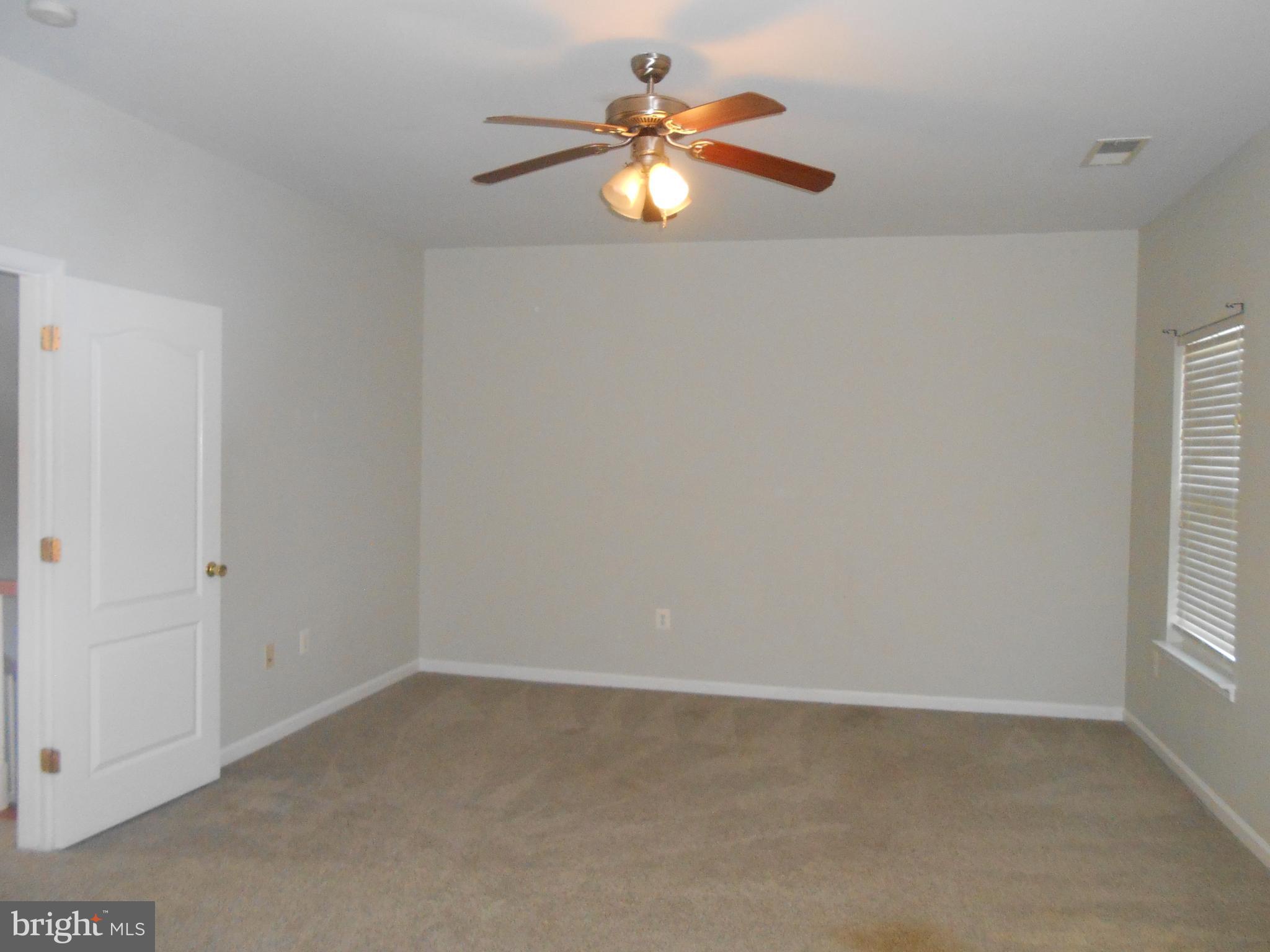 202 London Downs Circle Stephens City, VA 22655 - Photo 21 of 22 a view of an empty room with a window