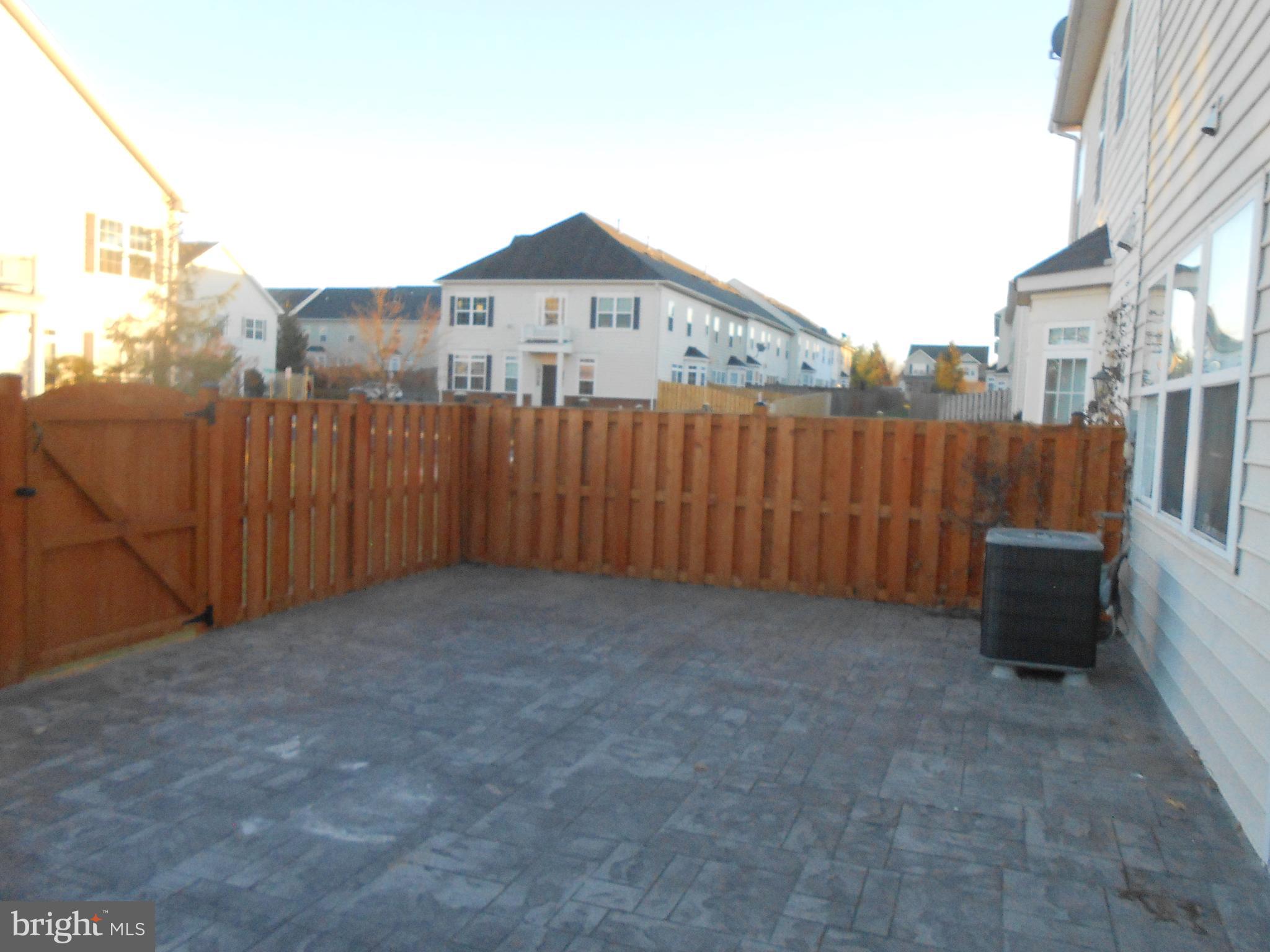 202 London Downs Circle Stephens City, VA 22655 - Photo 8 of 22 a view of a house with a fence