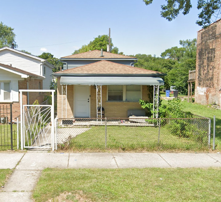 6732 South Peoria Street Chicago, IL 60621 - Photo 1 of 22 a view of a house with a porch and furniture