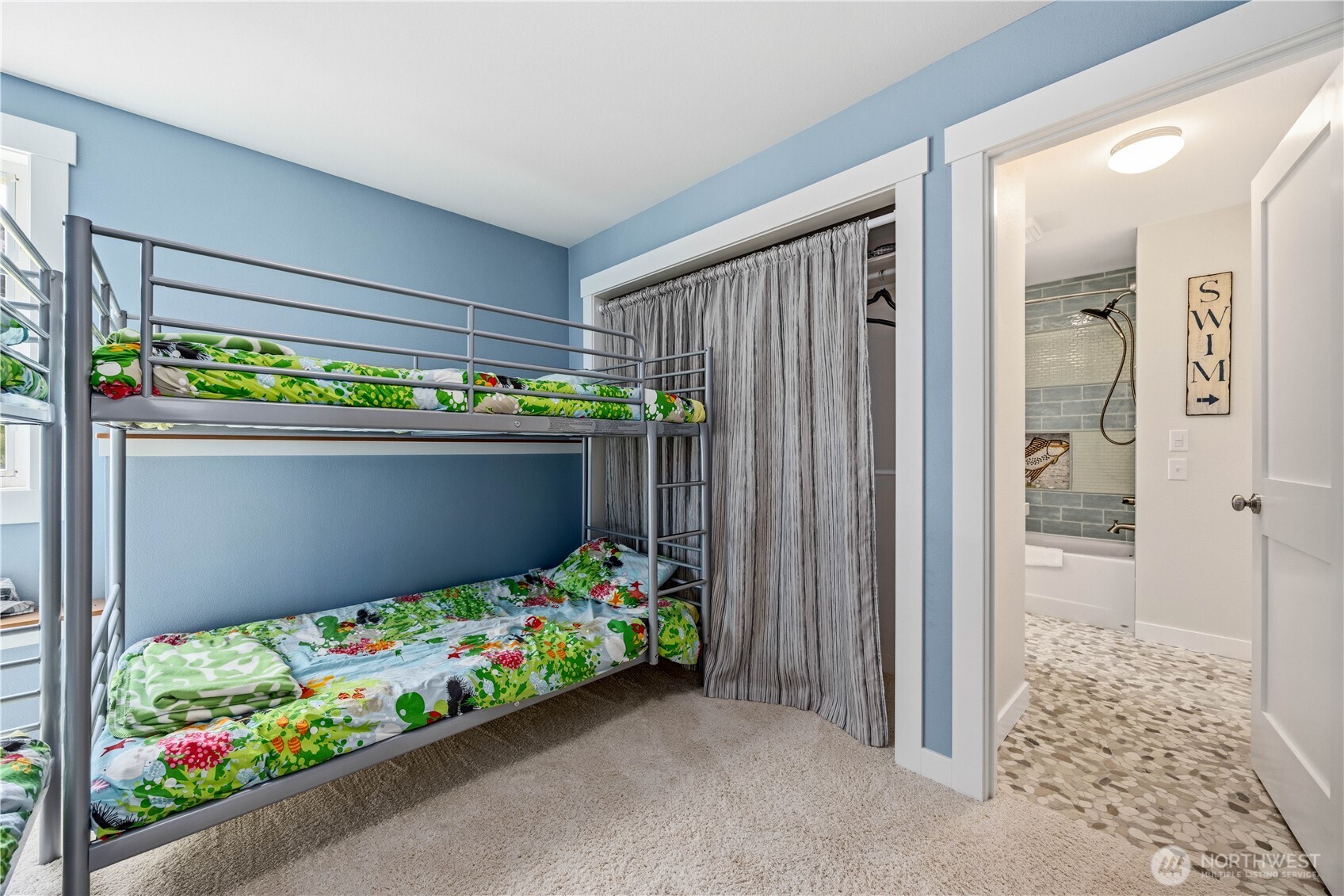 141 Sunset Place Manson, WA 98831 - Photo 19 of 38 a wooden floor in a bedroom