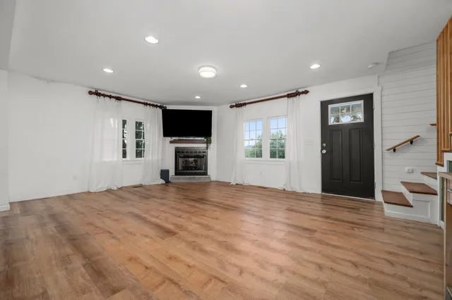 a view of livingroom with furniture and wooden floor