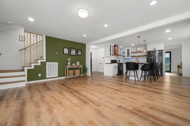 a view of a living room and livingroom with furniture