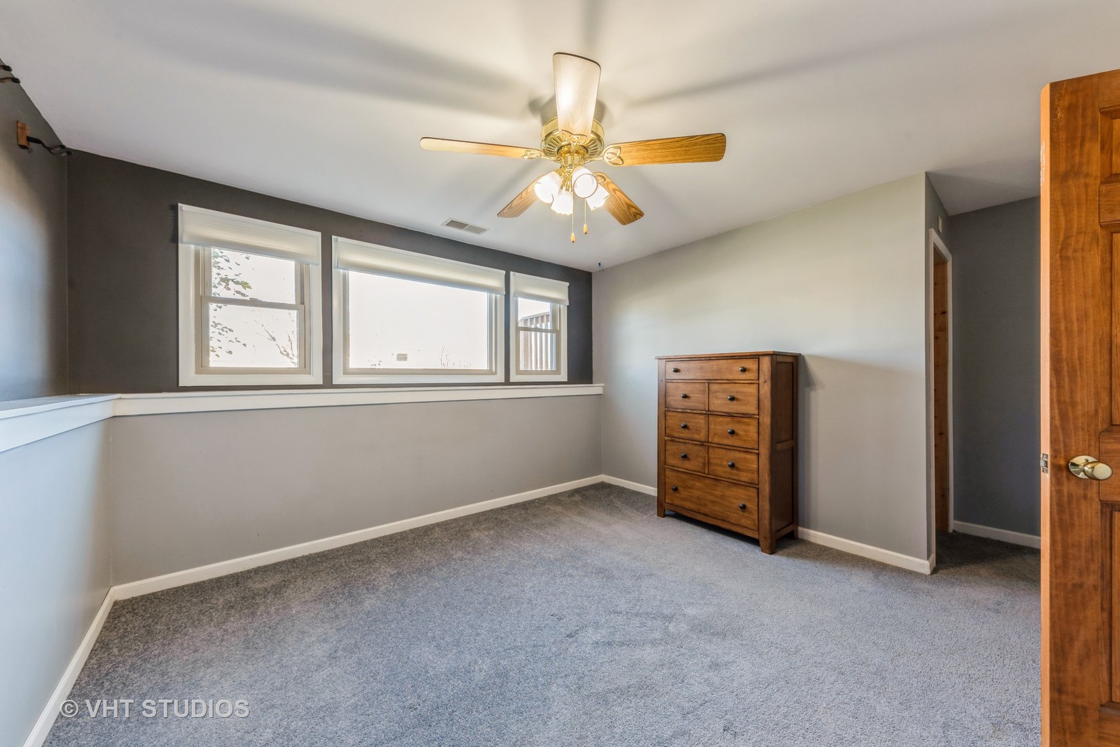 798 Amanda Road New Lenox, IL 60451 - Photo 14 of 20 an empty room with chandelier fan and windows