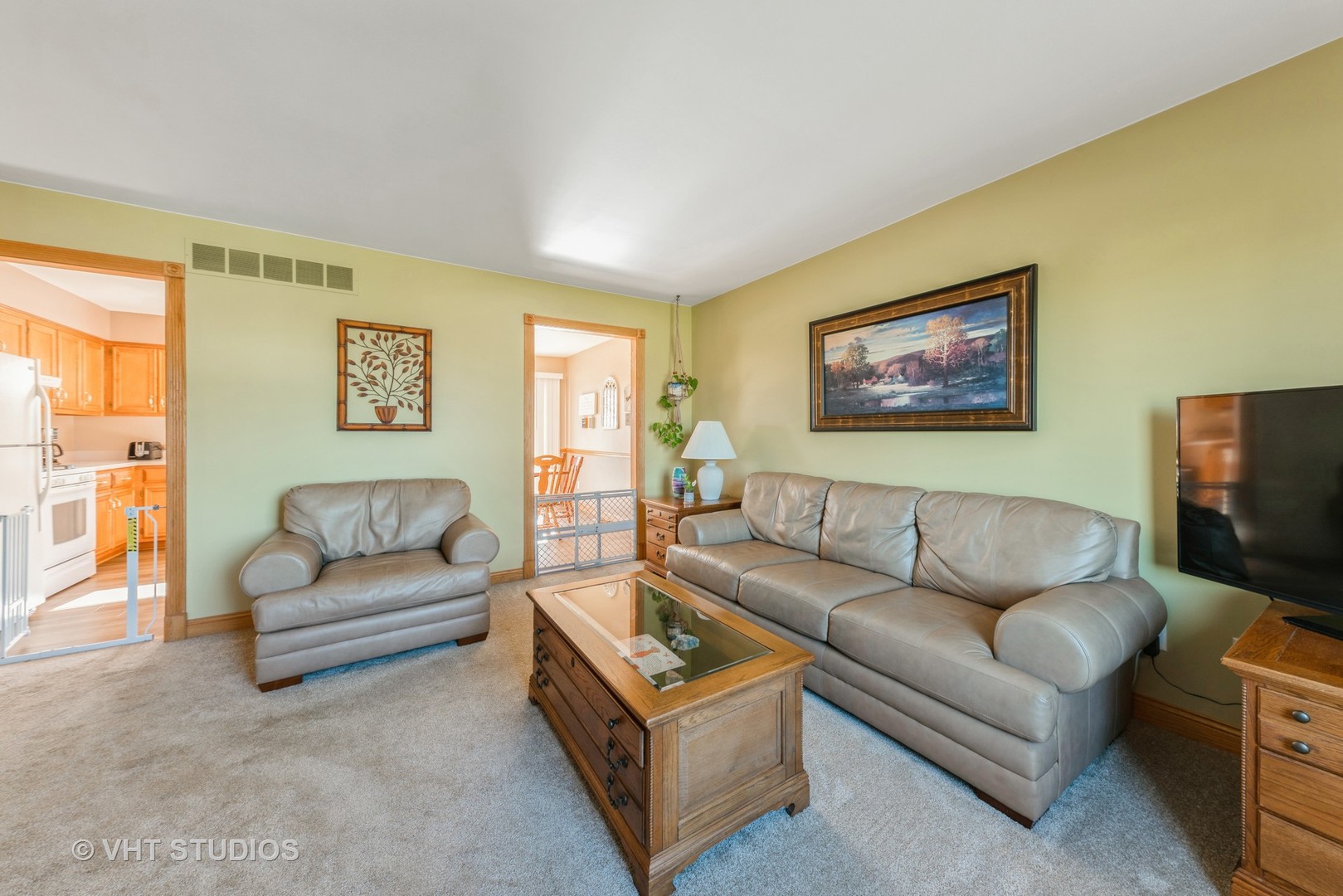 798 Amanda Road New Lenox, IL 60451 - Photo 3 of 20 a living room with furniture and a flat screen tv