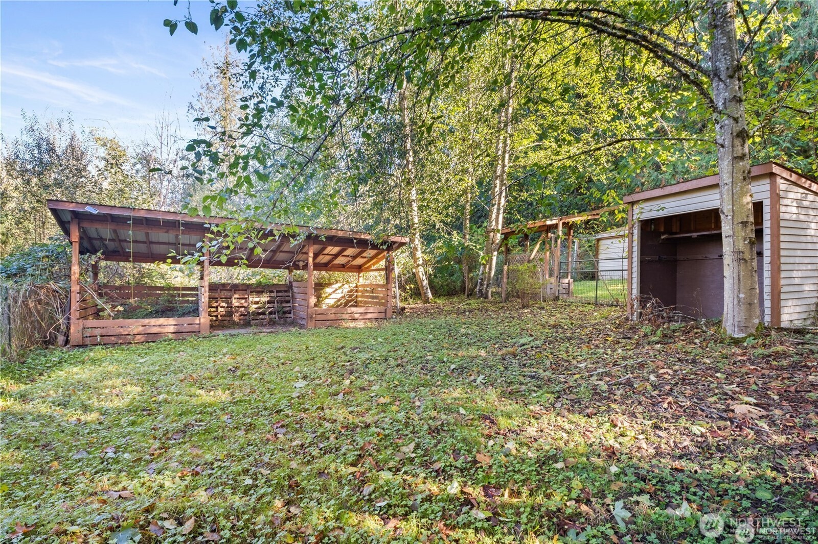 14310 200th Avenue Southeast Renton, WA 98058 - Photo 22 of 39 a view of a backyard with a garden